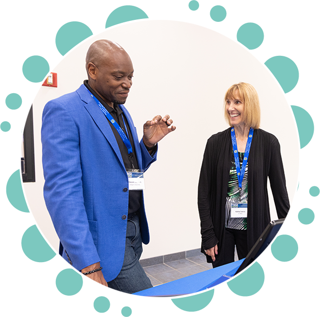 two people talking at a TBSR event